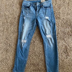 Light wash ripped skinny jeans